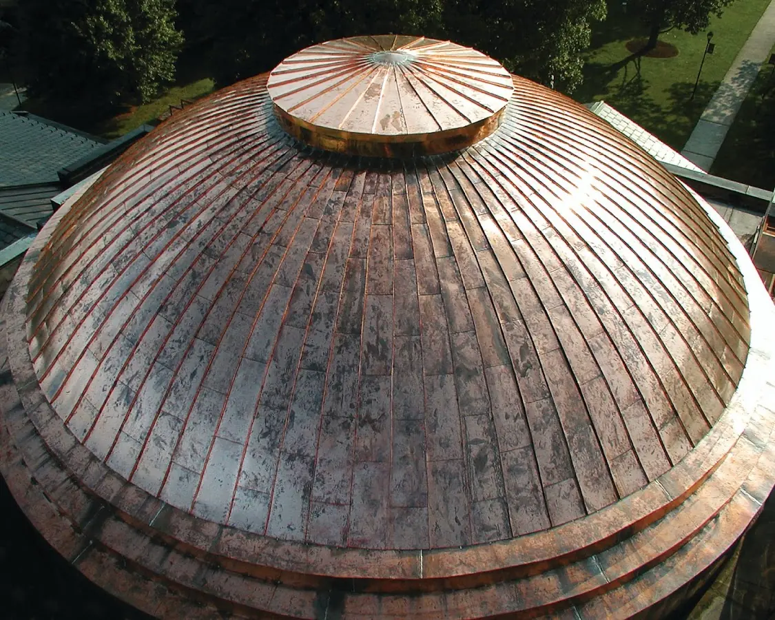 Craftsman Roofing crew installing a new roof in Plattsburgh